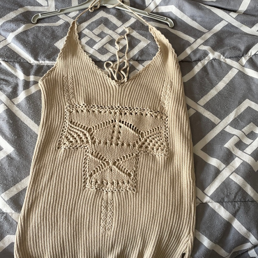 A Calvin Klein knit top.